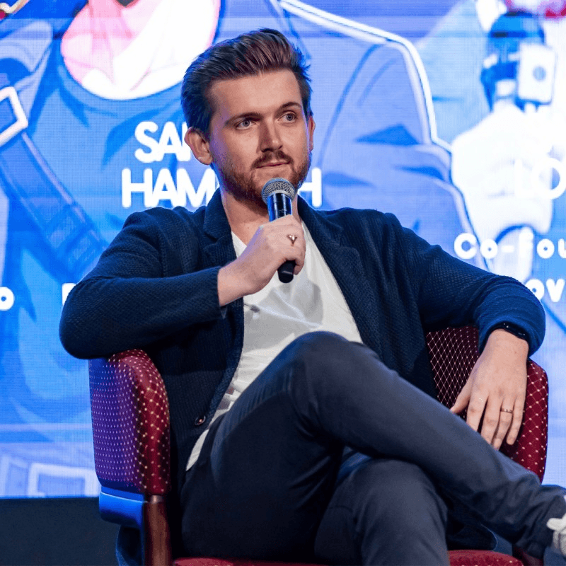Sam Loyd speaking on a panel